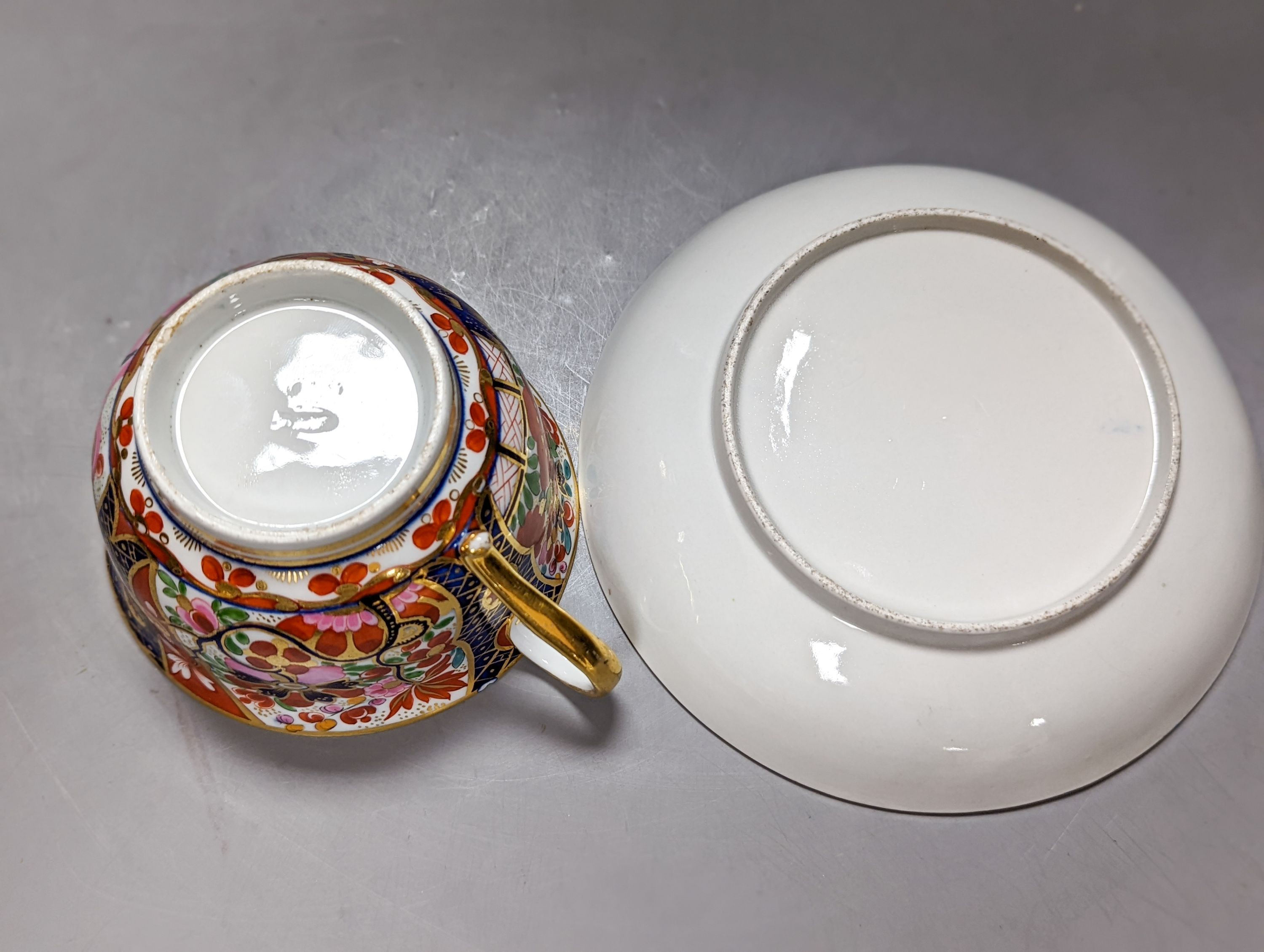 A pair of Chamberlain's Worcester miniature vases and Barr, Flight & Barr Worcester tea cup and saucer, early 19th century